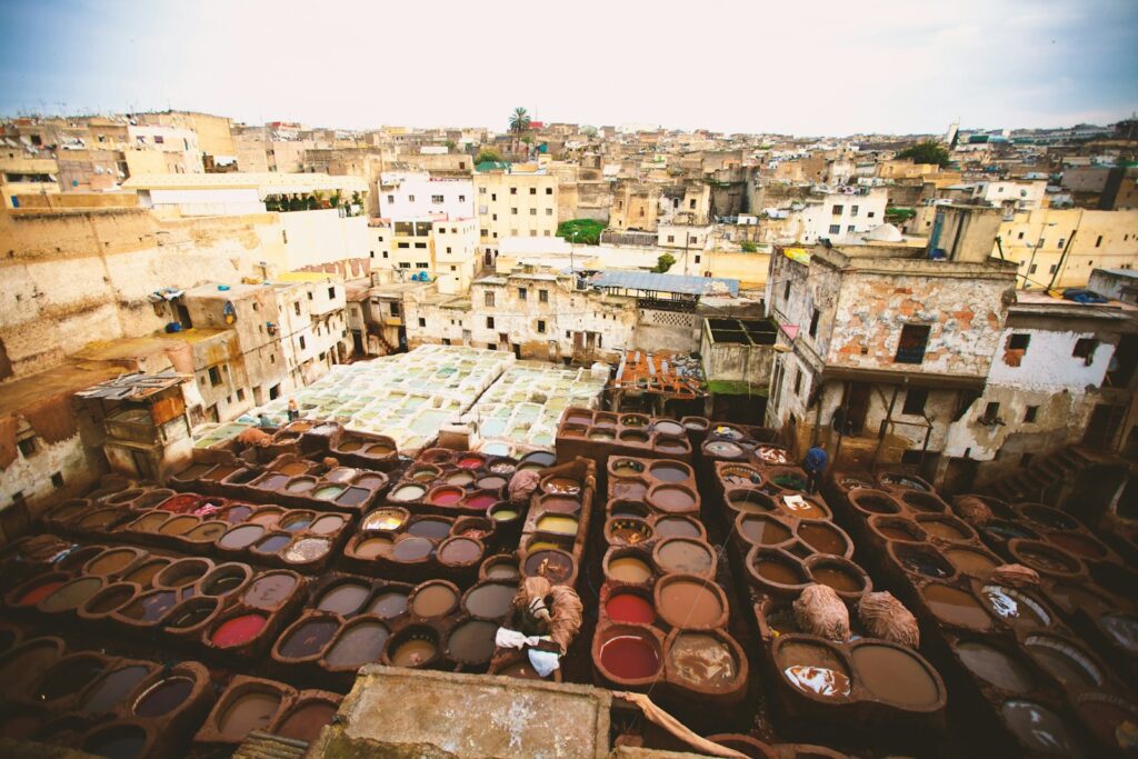 concrete houses during daytime - Fes